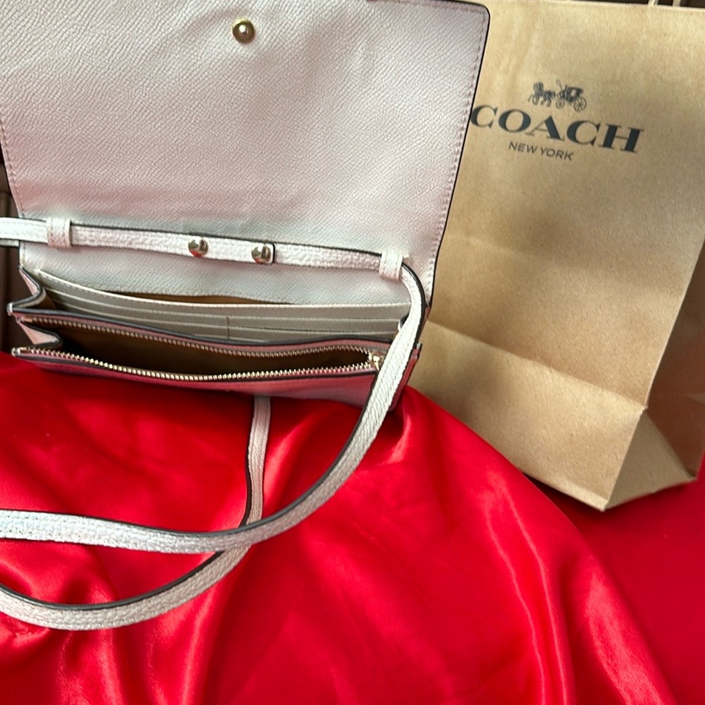 White Coach Crossbody Bag.Genuine leather wear it dressy or casual
